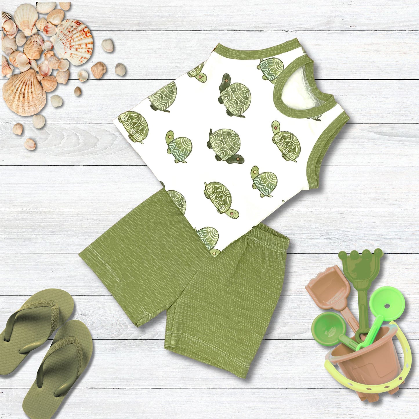 Cute Turtle Short set. Top is turtles on a white background with matching green shorts.
