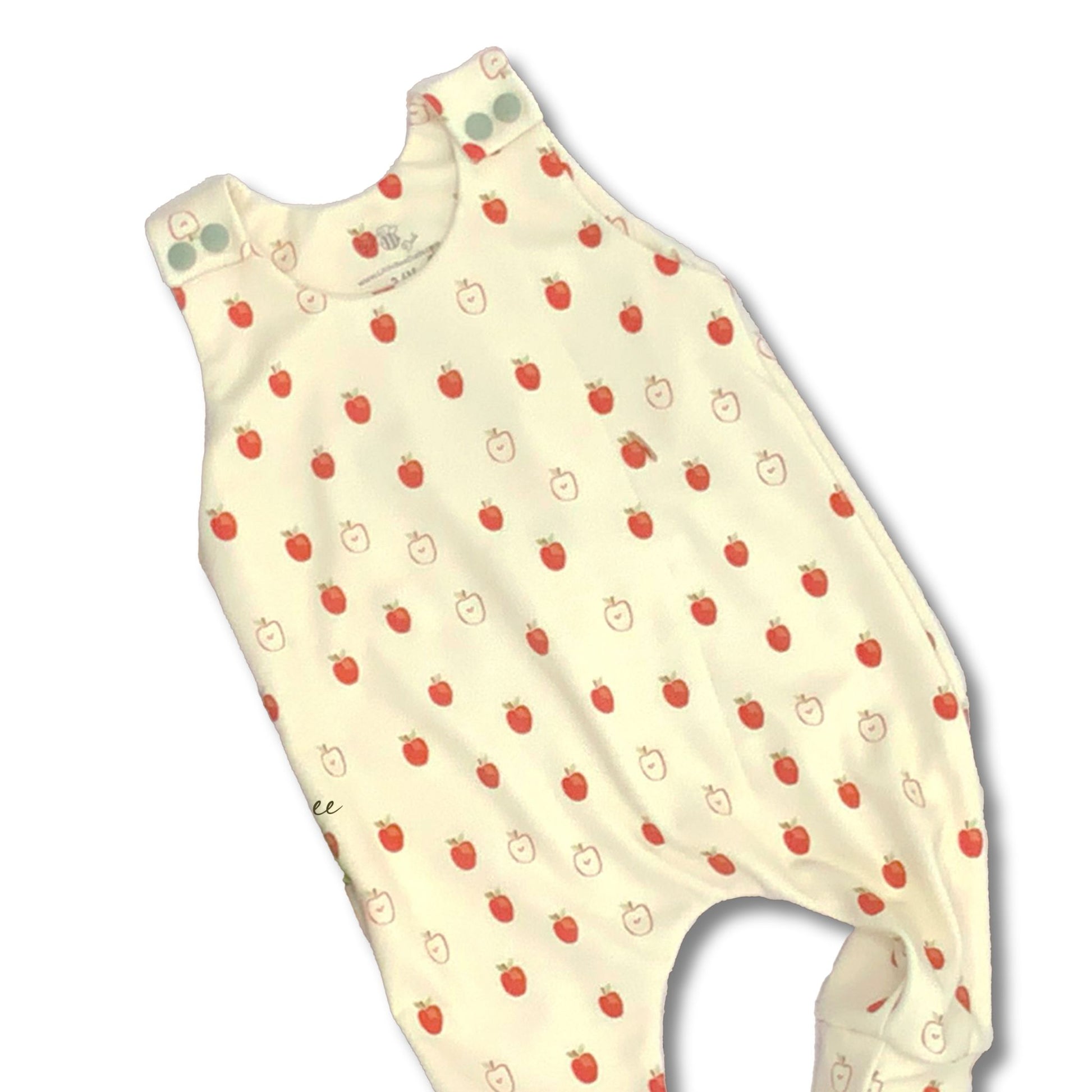 Long romper with apples in light red on a cream background