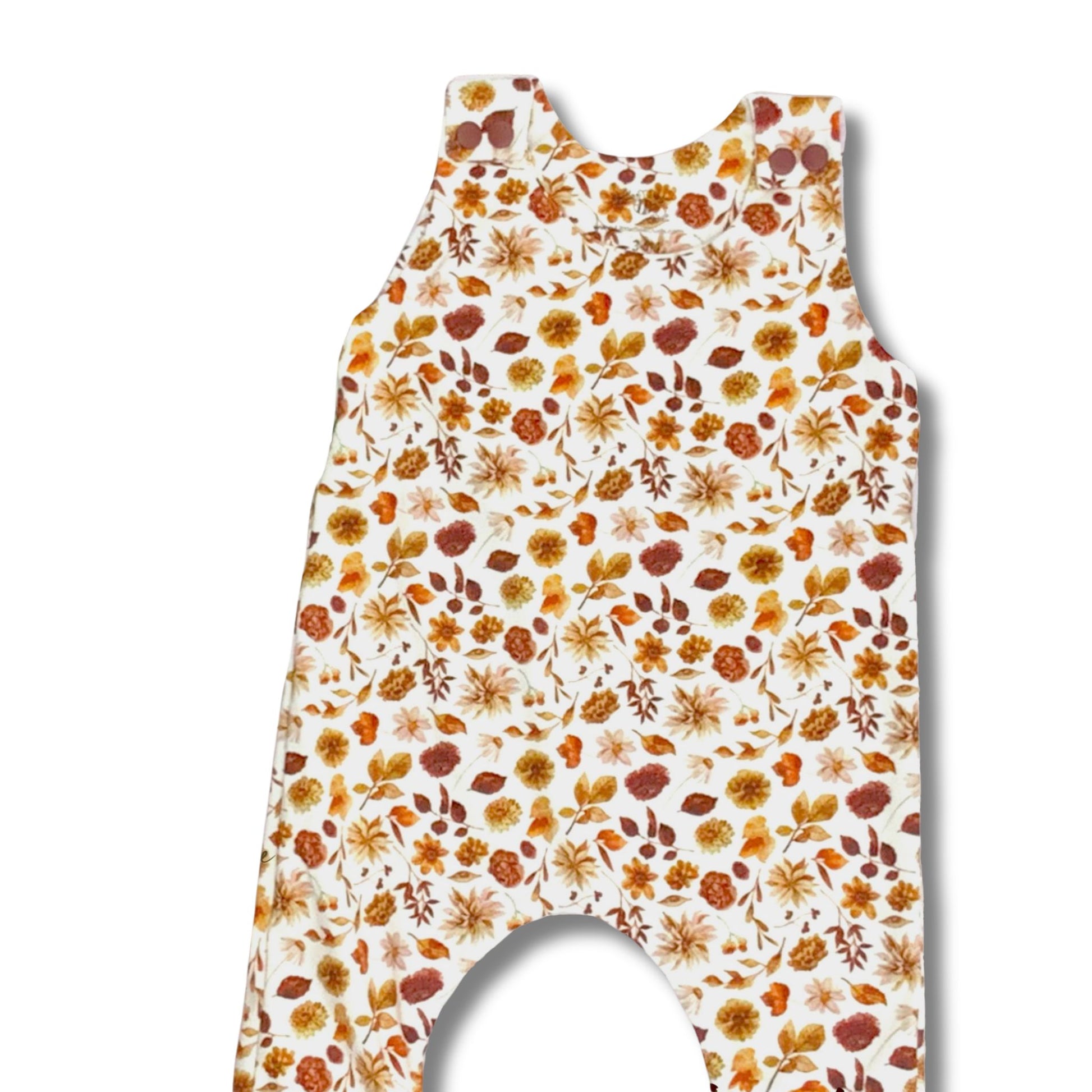 Fall floral print long romper in shades of rust and tan on a white background.