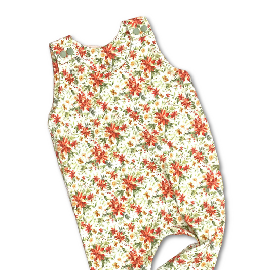 Pretty festive poinsettia print on a long romper.  Organic cotton baby and toddler romper